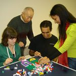  A team working on one of the tasks used in the study. Teams were asked to assemble complicated Lego® structures based on detailed instructions. Teams were randomly assembled by soliciting participation via Craig's List. Credit: MIT